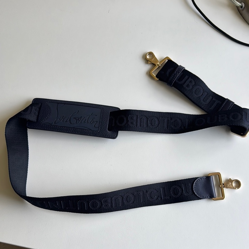Christian Louboutin dark blue Strap with Gold Hardware